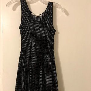 Flowy black polka-dot dress